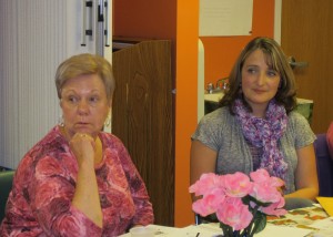 Anne Klein of the Brockport Breast Cancer Plus Other Women’s Cancers Support Group and Jessica Salamone, (right) certified genetic counselor with Elizabeth Wende Breast Care LLC, listen as another group member asks a question about BRCA I & II genetic testing.