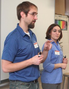 Optimax employees Matt Brophy, a research and development ceramic engineer, and Stacy Kelly, a human resources generalist, spoke to students about the engineering and technology field during Career Day. 