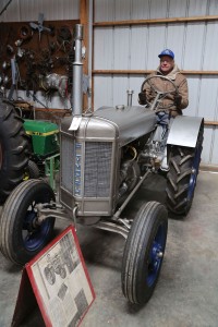Rex Horton sits astride his 1934 Plymouth tractor; it’s the oldest and most valuable tractor he owns and is number 18 of 213 produced by the Plymouth factory, located in Plymouth, Ohio. Owing to a court order brought about by the Chrysler Corporation over the use of the name “Plymouth,” the company name was changed to Silver King. One of these tractors brought $25,000 at an auction 15 years ago.