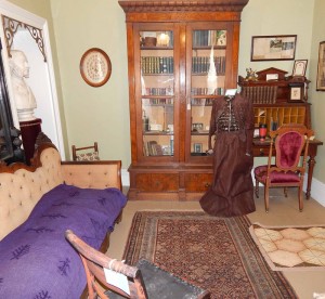 The Mary Jane Holmes room contains a complete collection of her novels and several pieces of furniture from her very large home which she referred to as her “Little Brown Cottage.” 