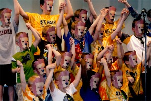 Students from a variety of classes donned lion’s face masks as they sang and waved their arms to the music of “I have the courage.”
