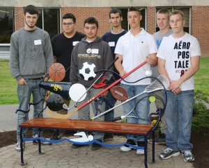 The new bench was unveiled during a ceremony on May 29 by students (l to r) Brenden Feeney - Greece Arcadia; Norberto Flores, Jr. - Gates Chili; Jonathan Bullers - Churchville-Chili;  Tom Pharoah - Churchville-Chili; Travis Wooledge - Greece Arcadia; Jordan Kibby - Greece Athena; Christian Davey-Ruell - Hilton High School.