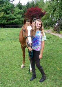 Alyssa Kelly, 14, a student at Spencerport High School, recently adopted Cassie after volunteering at the H.O.R.S.E. Rescue and Sanctuary. President Marial Ophardt said that Cassie is a perfect example of what can be done with a rescue and is so well trained that she could compete in a show.