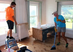Melinda Keirsbilck and her son, Jason, pitch in to do some prep work at the Pilon house. “We love the Pilon family,” said Melinda, whose sons were students at Quest Elementary School where Suzanne Pilon teaches. “She is one of those people who always has a smile on her face and a kind word, and when you meet her you never forget her.” 