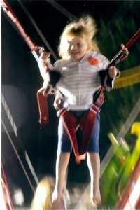 This shot of a youngster on the Super Bungee Jump was taken at night without flash, at an exposure index of 5,000. Just another illustration of the amazing capability of digital equipment, says photographer Walter Horylev.