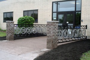 Two railings with medallions representing each of the 12 schools in the BOCES 2 area are the product of hard work from WEMOCO students.