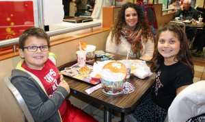 Jessica Tracy and her children Jenna, grade three, and Hunter, grade two, both students at Northwood Elementary School in Hilton, enjoy dinner at McDonald’s to help benefit the Northwood library.