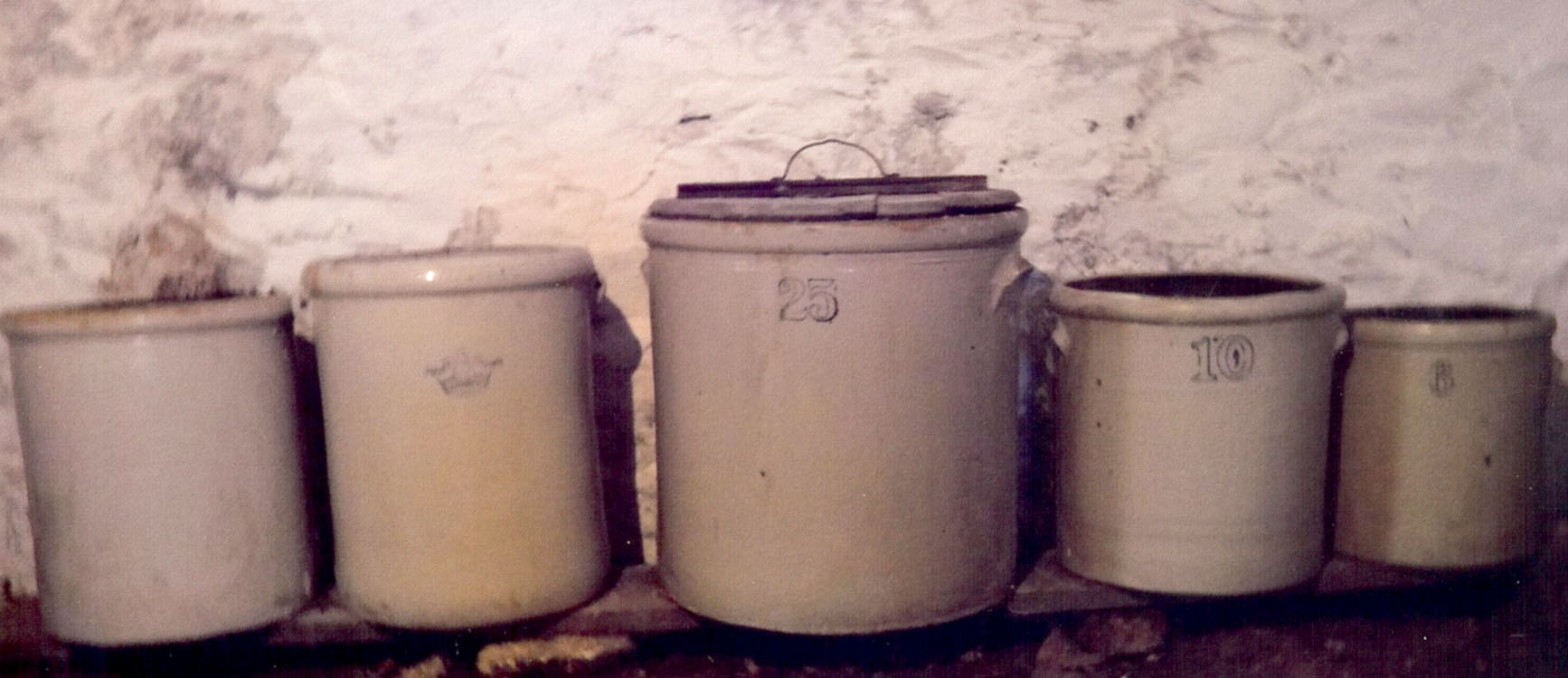 Shown above from the right: six gallon crock used storing eggs; 10 gallon.....