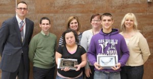 Back (l-r) Jr./Sr. High School Principal Aaron Johnson, along with committee members Phil Sweet, Kerri Smith, Paula Hohn, and Lisa Forsyth, presented Aaries Fitzsimmons and Danny Khomitch with a plaque, certificate, and lunch in recognition of their continued commitment to the community. Provided photo.