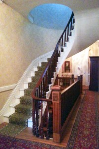 A unique architectural feature at the top of the staircase displays moments in time denoted by the Morgan Manning House’s original owners. Provided photo.