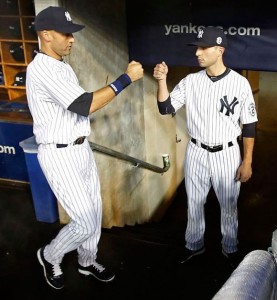  Derek Jeter gives Aaron a pre-game dap before he took the field for his final home game last season. Provided photo