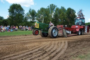  2013 Monroe County Fair tractor pull competition. Other attractions include a children’s fun zone, live music, and events for all ages. David Knox Photography 