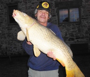 Keith Compton holding his prized 43” Asian Carp that qualified him for an In-Fisherman Master Angler Award in 2013. Provided photo