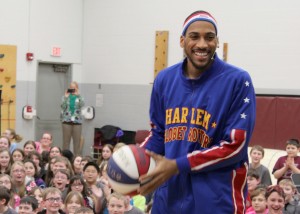  Harlem Globetrotter Zeus McClurkin encourages Byron-Bergen Elementary School students to value the character traits of cooperation, healthy mind and body, effort, enthusiasm and responsibility. Provided photo