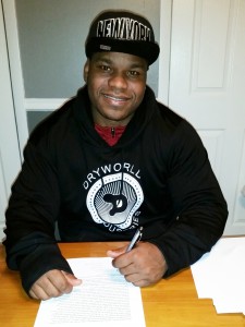 Felix Joyner signs his contract with the MLFB. Provided photo