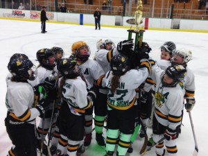 Tri-County Squirt team celebrating their win in the David Bigelow Tournament. Provided photo
