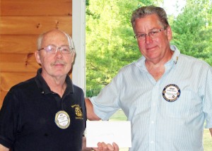 Brockport Rotarian President Brad Mitchell (right) presented Art Appleby a gift certificate for his many community endeavors, especially leading BISCO and the annual Brockport Arts Festival. Appleby just retired from a 15 year stint on the Village Planning Board, is an Olympics of the Mind internationally rated judge, has had a long standing involvement with scouts and many other good deeds to his credit. Former BISCO presidents Pat Baker and George Dahl spoke to Appleby’s many community efforts and his reputation as the consummate volunteer - always saying yes to a worthwhile cause. Provided photo and information. 