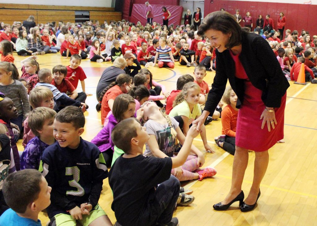 Lieutenant Governor Kathy Hochul shakes hands with students at Village Elementary School in Hilton. Provided photo
