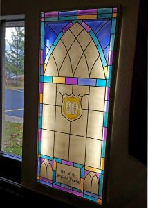 Close up of the recreated stained glass window dedicated by the Schleede family. Photo by Grace Griffee