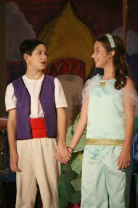 From left, Chris Nettles (Aladdin) and Megan Gates (Jasmine) sing a song together. Provided photo