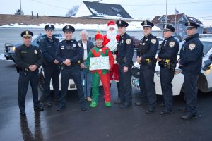 Chief Varrenti, Officer Wakefield, Officer Sime, Planning Board Member Ronald Staub, Elf Cave, Santa Sgt. Wheat, Officer Catlin, Officer Dawson, Officer Vadas and Officer Clawson. Provided photo