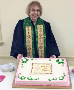 UCC Interim Pastor Diane Ellis next to her celebratory cake. Provided photo