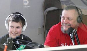 Rocco Stagnitto doing live radio broadcast with Rochester's youngest addiction advocate, his youngest son 11 year old Sebastian. Provided photo