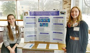 Brighton High School student Aelis Spiller and Brockport High School student Laine Ramsay present at the Science Congress. Provided photo