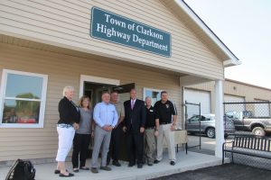 Clarkson Town Board members join New York State Senator Joseph Robach and Clarkson Highway Superintendent Bob Viscardi outside the newly completed offices at the Highway Department Garage on Route 19.  (L-R):  Councilperson Jackie Smith, Councilperson Christa Filipowicz, Supervisor Paul Kimball, Highway Superintendent Bob Viscardi, Senator Robach, Councilperson Allan Hoy and Councilperson Patrick Didas. K. Gabalski photo 