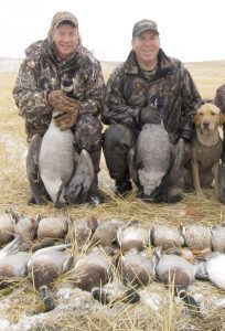 Three hardcore waterfowlers doing what they love. From left to right, Pat Breen, Dan (Waldo) Shannon and Cove. Provided photo