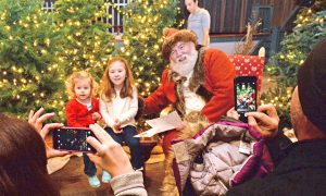 The cameras come out and it’s all smiles as youngsters meet St. Nick during Genesee Country Village & Museum’s Breakfast with St. Nick. Provided photo