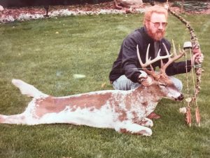 Mark Powley with an amazing 12-point piebald buck he shot with his recurve bow in Spencerport in 1997. Lower property taxes are more common than a buck of this caliber in Spencerport. Provided photo