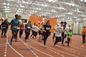 5K Runners on the Gordon Field House indoor track. Provided photo