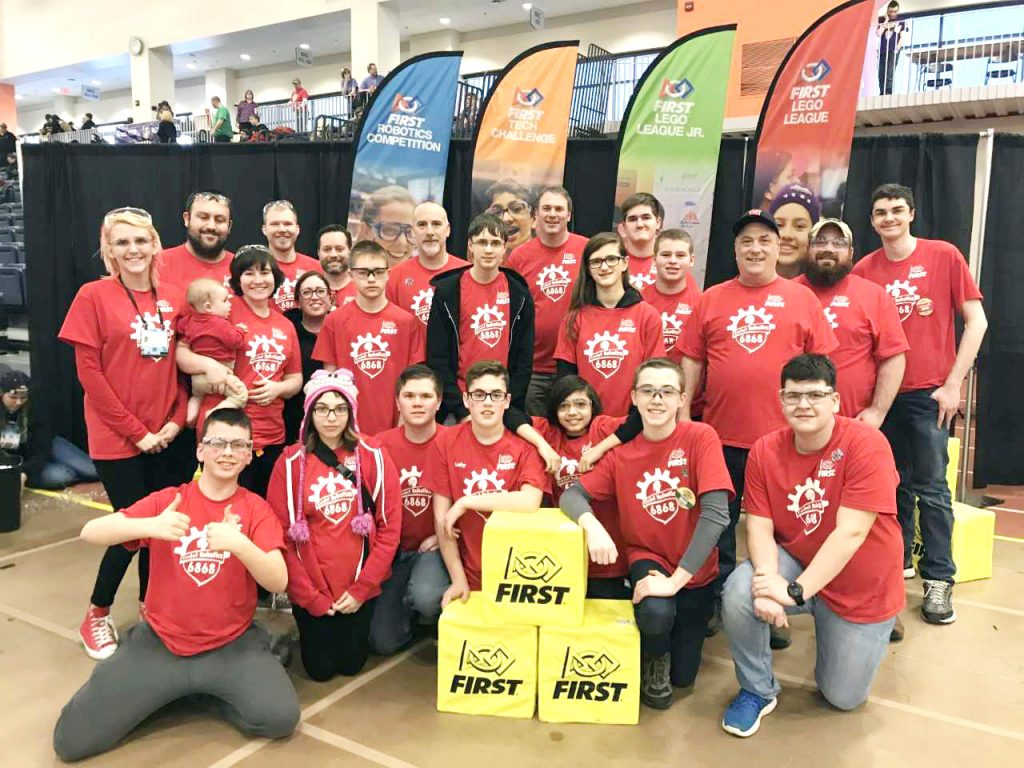 The Hilton Cadets Robotics Team and advisors: (l-r, front) Andrew Carlton, Magdalena Lupia, Zachary Popielarz, AJ Williams, Xavier Camacho, Nicholas Randall and Lucas Eberhardt; (center) Gwen Hart, Stephanie and Lucas Mattice, Lori Williams, Owen Avery, Alex Pickering, Cierra Maimone, Logan Kibby and Matt Jardine; (back) Alan Mattice, Jairus Martin, James Avery, Steve Randall, David Hay, Elijah Giesy, John Redshaw and Jordan Hay. Provided photo