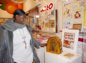 Pictured, Activities Director Cathy Toney at the Jell-O Museum Gallery. Provided photo