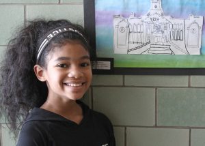 Lariana Drumgoole, grade 4, worked with art teacher Anne Clancy to create her architectural drawing of Churchville Elementary School’s facade. 