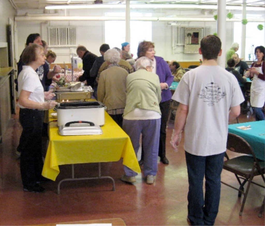 A group of over 12 volunteers served those in attendance at the first Loaf and Ladle in March. The next meal will be provided on April 29. Provided photo