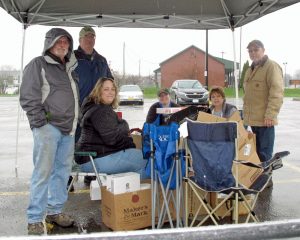 The first shift of Rotarians is shown under shelter. L-R are Assistant District Governor for Area 9 Bill Ewsuk, local club members Dave Arnold (also BISCO Treasurer), Brandi Reis (treasurer), Linda Menear (president elect), Eileen Whitney (president) and Art Appleby (also BISCO president.) Provided photo