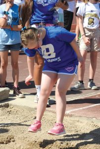 Brockport athlete participating in the Standing Long Jump.