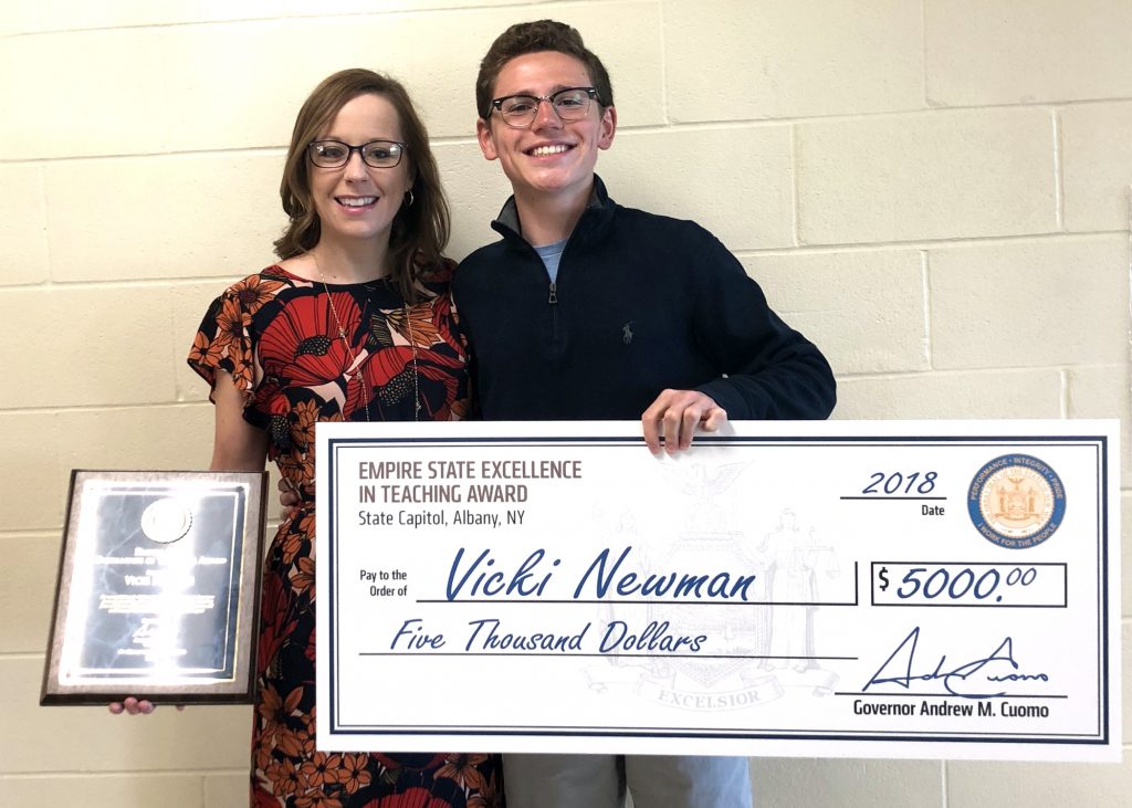 Hilton High School math teacher Vicki Newman receives the Empire State Excellence in Teaching Award after being nominated by her former student senior Michael Speciale. Provided photo 