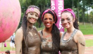 Tami Mungenast with her daughters Hannah and Julia after completing a mud run (Dirty Girl Mud Run).