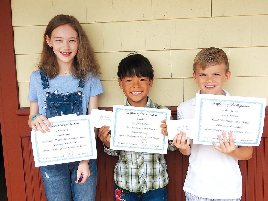 Elementary winners, l-r: Iris Clements, John Laduke and Brody O’Keefe. Photo by Karen Fien