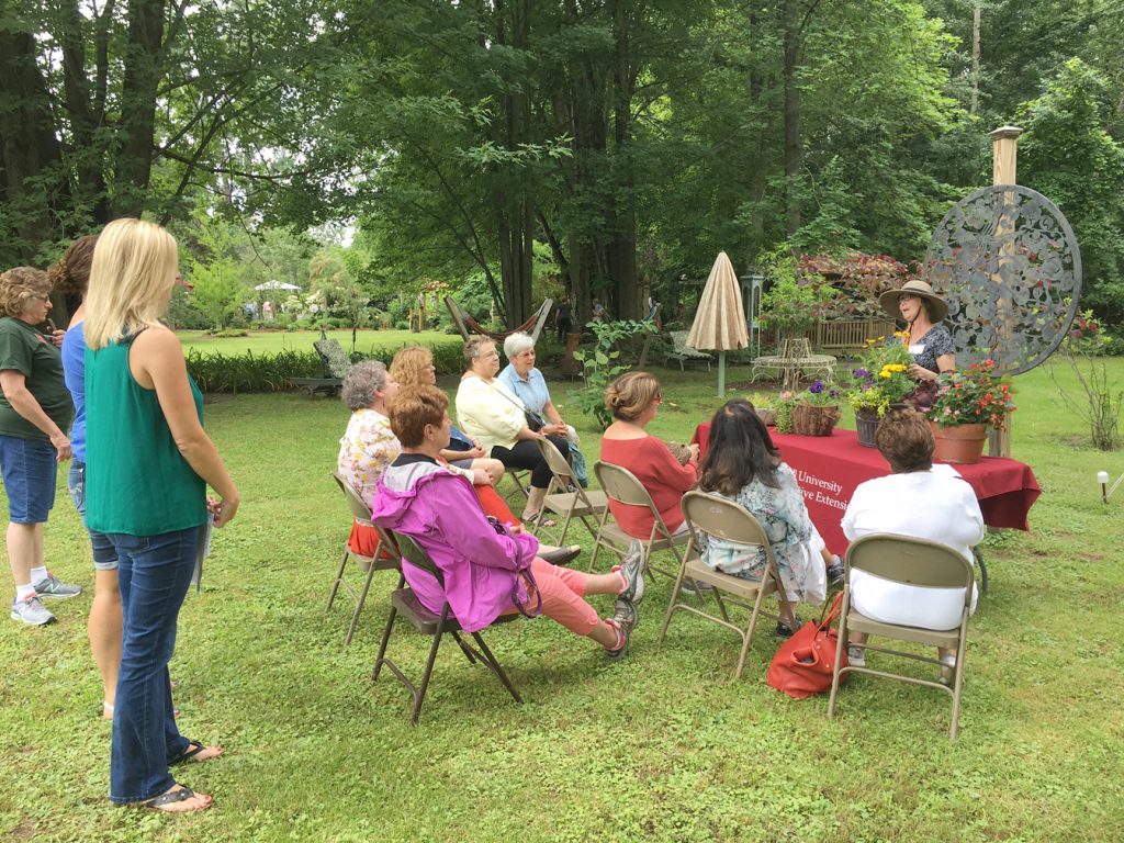 Master Gardener Karen Cavenaugh leads a short presentation at last summer’s Garden Party.  This year’s Summer Symposium will also feature various presentations by Master Gardeners as well as Darrel Oakes of LynOaken Farms. Provided photo