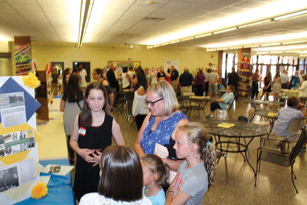 Students shared their findings with community members at the Spencerport Heroes event on June 12.