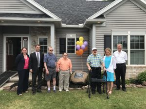 Left to right - Kate Munzinger, representing Joe Robach, David Meisenzahl, Board Chair, The Arc Foundation of Monroe, Peter, Guy, Gary, Barbara Wale, President/CEO of The Arc of Monroe, David Irish, Board Chair, The Arc of Monroe. Provided information and photo