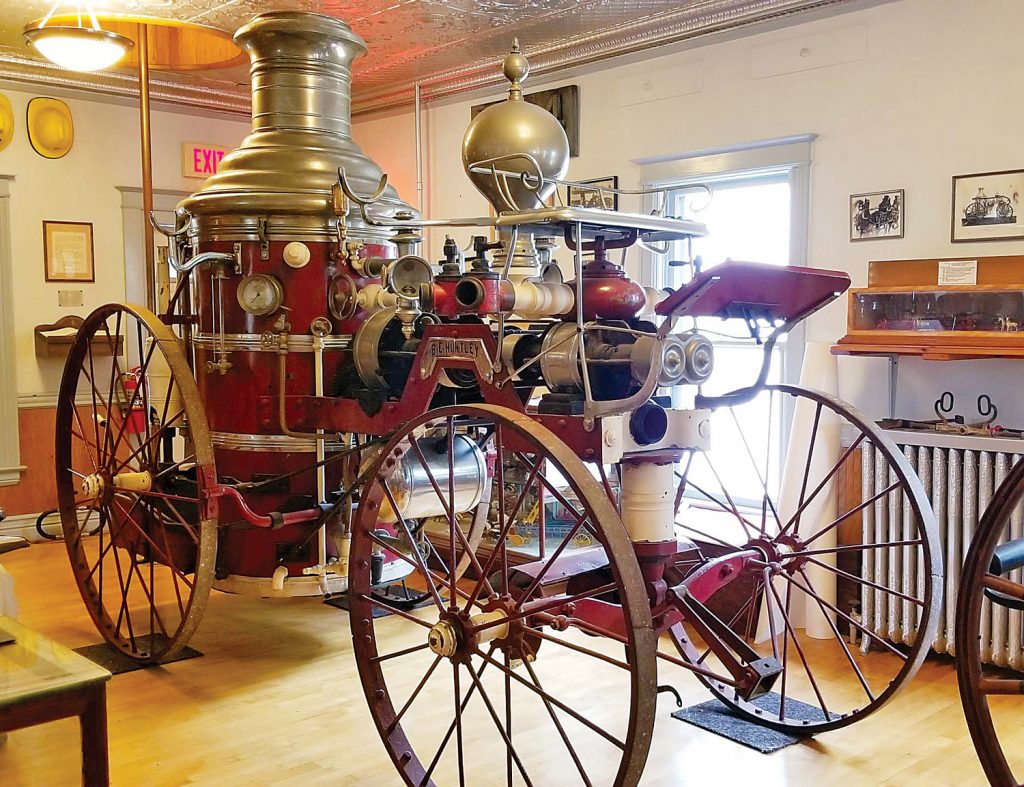 This steam pumper was purchased after a major fire in 1877 destroyed much of the business district on Market Street. There had been little or no fire protection for the growing village. Purchased from Silsby Mfg Co. in Seneca Falls, NY, it was in service until the early 1900s. Improved over the Hand Pumper, it was steam-powered and horse-drawn. Photo by Dianne Hickerson