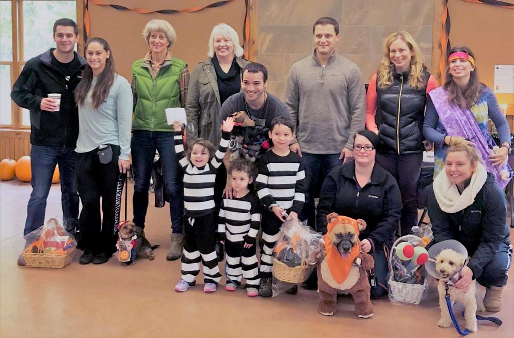 Costume contest winners with their humans and the judges. Provided photo