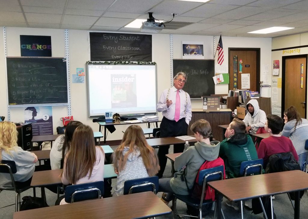 Honorable John C. Ninfo, retired federal bankruptcy judge, speaks to Theresa Jasen’s Career and Financial Management classes at Hilton High School about financial wellness. Provided photo.
