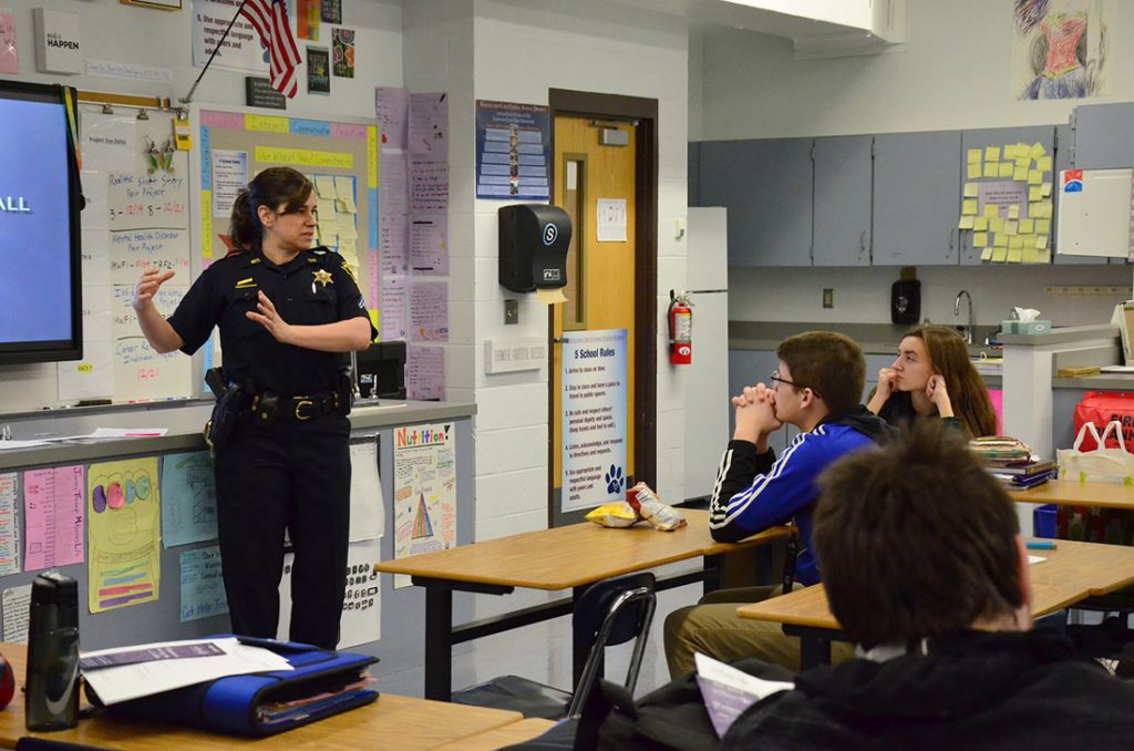 Deputy Crandall provides students with domestic violence resources on day two of her presentation. Photo by Jackie Finn