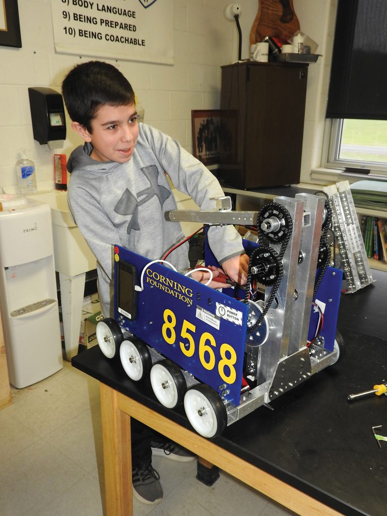 Sal Pino, a student on the Spencerport FRC team who was preparing for one of their regional competitions at Corning High School.